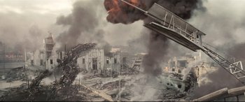 Movie still from “Battle Los Angeles” (2011), directed by Jonathan Liebesman – An image of an explosion in a city; Extreme Wide shot, Low angle