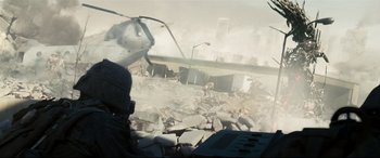Movie still from “Battle Los Angeles” (2011), directed by Jonathan Liebesman – A helicopter flying over a pile of rubble in the air; Extreme Wide shot, Low angle