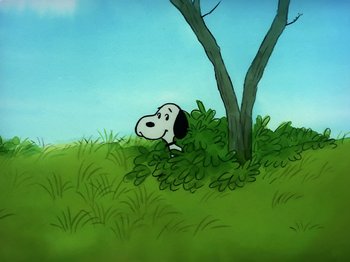 Movie still from “Be My Valentine, Charlie Brown” (1975), directed by Phil Roman – A painting of a dog sitting in the grass next to a tree; Extreme Wide shot, High angle