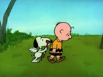 Movie still from “Be My Valentine, Charlie Brown” (1975), directed by Phil Roman – A charlie brown and snoopy dog walking in a field; Extreme Wide shot, High angle