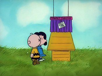 Movie still from “Be My Valentine, Charlie Brown” (1975), directed by Phil Roman – Charlie brown and lucy in a puppet theater; Extreme Wide shot, High angle