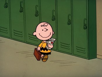 Movie still from “Be My Valentine, Charlie Brown” (1975), directed by Phil Roman – A charlie brown character holding a briefcase and money; Extreme Wide shot, High angle