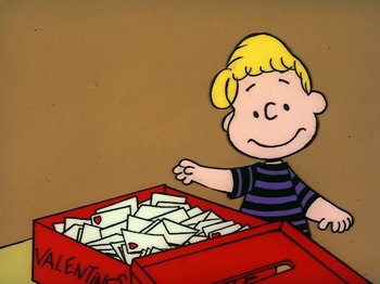 Movie still from “Be My Valentine, Charlie Brown” (1975), directed by Phil Roman – A cartoon of a boy standing in front of a box of mail; Medium shot, High angle