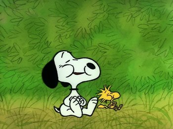 Movie still from “Be My Valentine, Charlie Brown” (1975), directed by Phil Roman – A drawing of a dog sitting next to a yellow bird; Extreme Wide shot, High angle