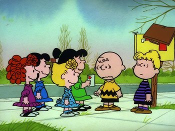 Movie still from “Be My Valentine, Charlie Brown” (1975), directed by Phil Roman – A group of people standing next to each other on a sidewalk; Extreme Wide shot, High angle