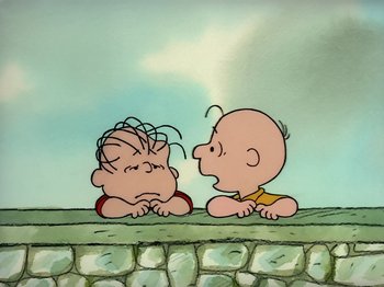 Movie still from “Be My Valentine, Charlie Brown” (1975), directed by Phil Roman – A couple of people that are sitting on the ground together; Medium shot, Low angle