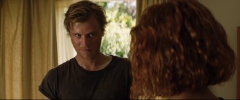 Movie still from “Beast” (2017), directed by Michael Pearce – A man and a woman looking at one another in the mirror; Close Up shot, Over the shoulder angle