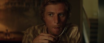 Movie still from “Beast” (2017), directed by Michael Pearce – A person holding a fork in his mouth; Close Up shot, Over the shoulder angle