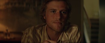 Movie still from “Beast” (2017), directed by Michael Pearce – A person wearing a shirt; Close Up shot, Over the shoulder angle