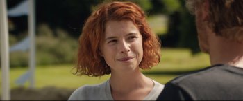 Movie still from “Beast” (2017), directed by Michael Pearce – A person with red curly hair; Close Up shot, Over the shoulder angle