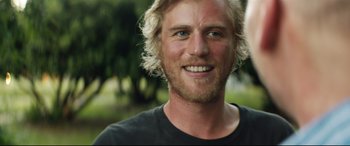 Movie still from “Beast” (2017), directed by Michael Pearce – A person with long blonde hair; Close Up shot, Over the shoulder angle
