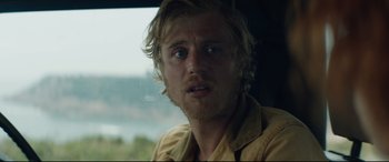 Movie still from “Beast” (2017), directed by Michael Pearce – A person in a car window; Close Up shot, Low angle