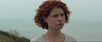 Movie still from “Beast” (2017), directed by Michael Pearce – A person with curly hair; Close Up shot, Low angle