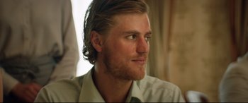 Movie still from “Beast” (2017), directed by Michael Pearce – A person with long hair and a beard; Close Up shot, Low angle