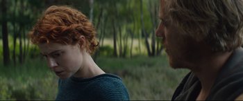 Movie still from “Beast” (2017), directed by Michael Pearce – A man and a woman talking in a wooded area; Medium shot, Over the shoulder angle