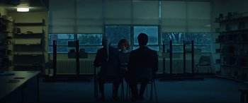 Movie still from “Beast” (2017), directed by Michael Pearce – A group of people sitting around a table; Wide shot, Over the shoulder angle