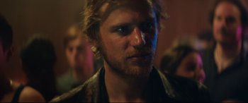 Movie still from “Beast” (2017), directed by Michael Pearce – A person with a beard; Close Up shot, Over the shoulder angle