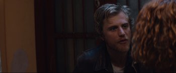 Movie still from “Beast” (2017), directed by Michael Pearce – A person wearing a leather jacket; Close Up shot, Over the shoulder angle