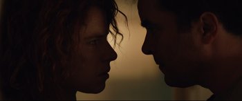 Movie still from “Beast” (2017), directed by Michael Pearce – A man and a woman face to face in the dark; Close Up shot, Low angle