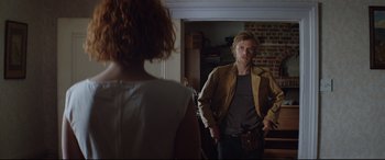 Movie still from “Beast” (2017), directed by Michael Pearce – A man and a woman in front of a mirror; Medium shot, Over the shoulder angle