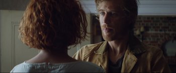 Movie still from “Beast” (2017), directed by Michael Pearce – A person looking at a mirror; Close Up shot, Over the shoulder angle