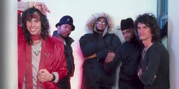 Movie still from “Beastie Boys Story” (2020), directed by Spike Jonze – A group of men standing next to each other; Medium shot, Low angle