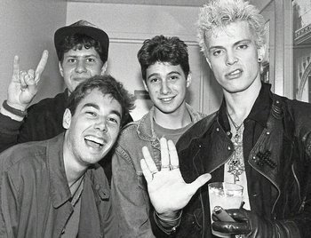 Movie still from “Beastie Boys Story” (2020), directed by Spike Jonze – A black and white photo of a group of young men; Medium shot, Overhead angle