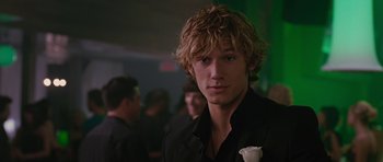 A person wearing a suit and tie
