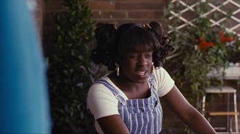 Movie still from “Beautiful Thing” (1996), directed by Hettie Macdonald – A young girl with pigtails is crying; Close Up shot, Over the shoulder angle