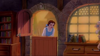 Movie still from “Beauty and the Beast” (1991), directed by Kirk Wise – A woman in a blue dress is standing in a room; Wide shot, Low angle