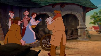 Movie still from “Beauty and the Beast” (1991), directed by Kirk Wise – An animated scene of a man and a woman reading a newspaper; Wide shot, Over the shoulder angle