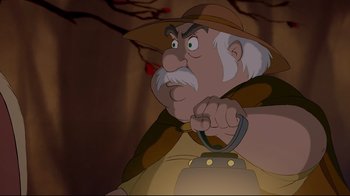 Movie still from “Beauty and the Beast” (1991), directed by Kirk Wise – An old man with a beard and a hat is holding something in his hand; Close Up shot, Low angle