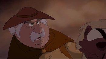 Movie still from “Beauty and the Beast” (1991), directed by Kirk Wise – An old man with a beard and a hat is looking at a dog; Close Up shot, Over the shoulder angle