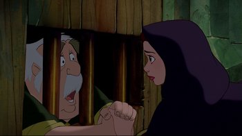 Movie still from “Beauty and the Beast” (1991), directed by Kirk Wise – An old man and a young woman are looking at each other; Medium shot, Over the shoulder angle