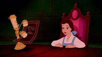 Movie still from “Beauty and the Beast” (1991), directed by Kirk Wise – A woman sitting at a table with a menu in front of her; Medium shot, High angle