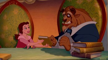 Movie still from “Beauty and the Beast” (1991), directed by Kirk Wise – A man and a woman are sitting at a table; Medium shot, Overhead angle