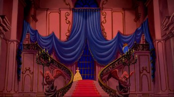 Movie still from “Beauty and the Beast” (1991), directed by Kirk Wise – A painting of a staircase with stairs leading up to a large blue curtain; Extreme Wide shot, Low angle
