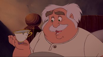 Movie still from “Beauty and the Beast” (1991), directed by Kirk Wise – An old man with a beard and a white mustache; Close Up shot, Over the shoulder angle
