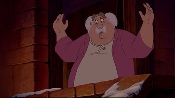 Movie still from “Beauty and the Beast” (1991), directed by Kirk Wise – A man in a pink jacket standing in front of a brick wall; Medium shot, Over the shoulder angle