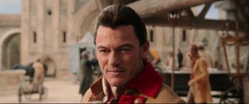 Movie still from “Beauty and the Beast” (2017), directed by Bill Condon – A person wearing a jacket; Close Up shot, Over the shoulder angle