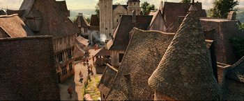 Movie still from “Beauty and the Beast” (2017), directed by Bill Condon – An image of an old town with a lot of people in it; Extreme Wide shot, High angle