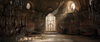 Movie still from “Beauty and the Beast” (2017), directed by Bill Condon – A room filled with chandeliers and a large window; Extreme Wide shot, High angle