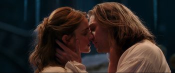 Movie still from “Beauty and the Beast” (2017), directed by Bill Condon – A man and a woman kissing each other; Close Up shot, Low angle