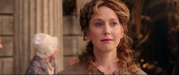 Movie still from “Beauty and the Beast” (2017), directed by Bill Condon – A person with long curly hair; Close Up shot, Over the shoulder angle