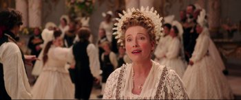 Movie still from “Beauty and the Beast” (2017), directed by Bill Condon – A woman in a white dress and a white crown; Close Up shot, Over the shoulder angle