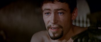 Movie still from “Becket” (1964), directed by Peter Glenville – A person with a beard; Close Up shot, Over the shoulder angle