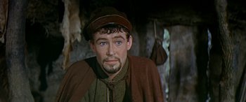 Movie still from “Becket” (1964), directed by Peter Glenville – A person wearing a hat and jacket; Close Up shot, High angle