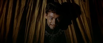 Movie still from “Becket” (1964), directed by Peter Glenville – A person wearing a black shirt; Medium shot, High angle