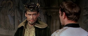 Movie still from “Becket” (1964), directed by Peter Glenville – A man wearing a crown talking to another man; Close Up shot, Over the shoulder angle
