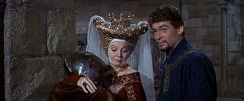 Movie still from “Becket” (1964), directed by Peter Glenville – A man and a woman in medieval garb; Medium shot, Over the shoulder angle